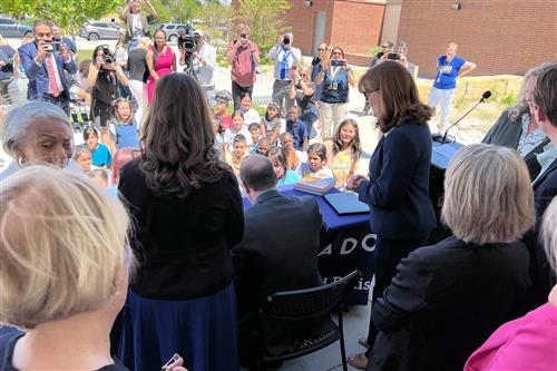 Gov. Polis signs new school funding bill